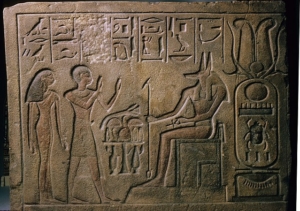 Stela of Siamun and Taruy worshipping Anubis MET 