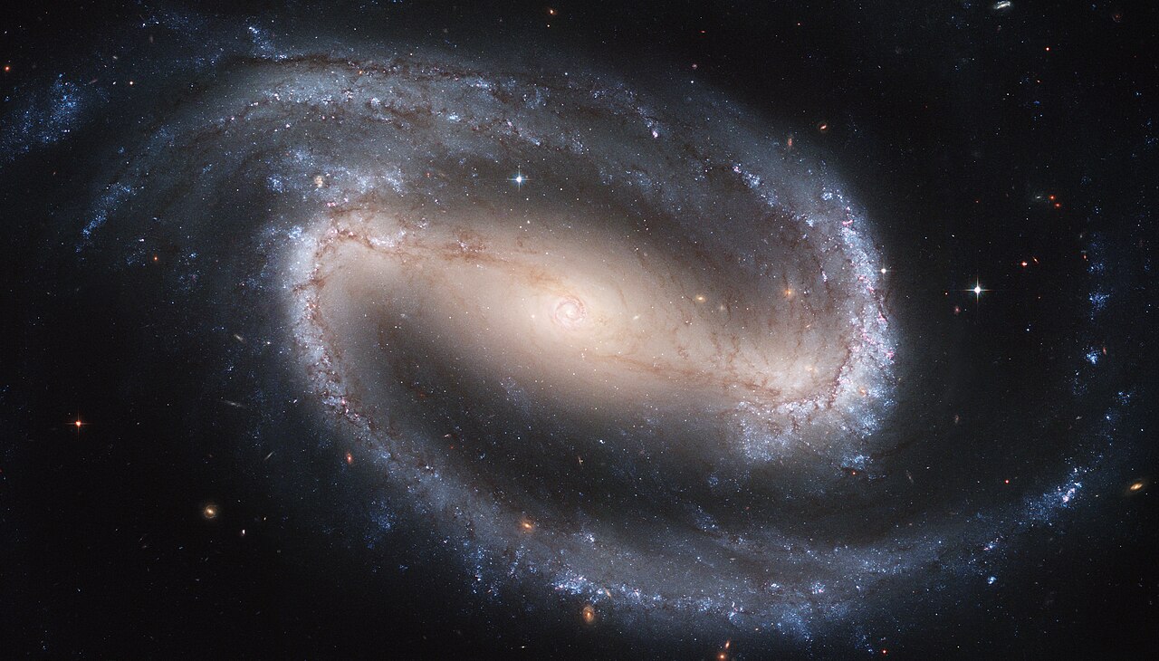 Stunning images: A twisted galaxy discovered by Hubble may hide a cosmic illusion